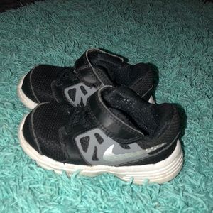 Size 5c black Nike’s. Gently worn